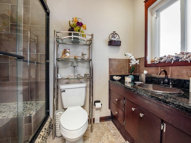 1818 Dolphin Blvd S, Saint Petersburg, FL 33707 - full bathroom with vanity, combined bath / shower with glass door, and toilet