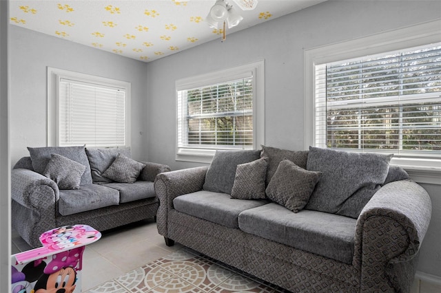 living room with light tile patterned flooring