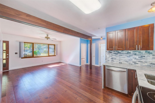 kitchen featuring dark wood-type flooring, open floor plan, dishwasher, decorative backsplash, and electric stove