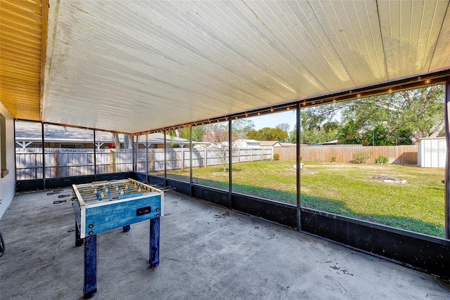 unfurnished sunroom with a wealth of natural light