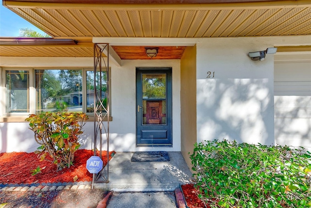 property entrance with a garage