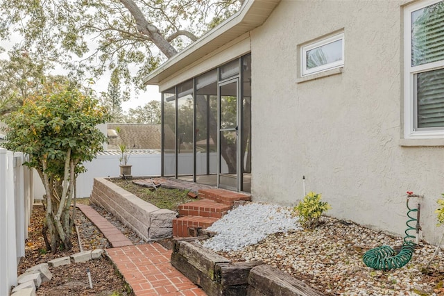 exterior space with a sunroom