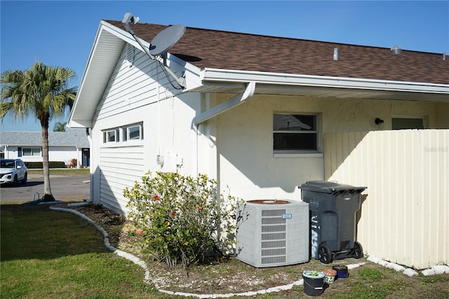 view of property exterior featuring central AC