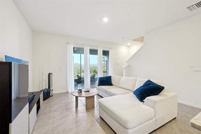 living room featuring light tile patterned floors