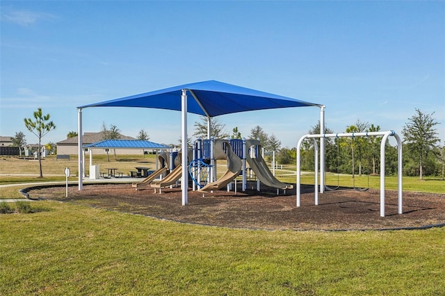 view of play area featuring a lawn