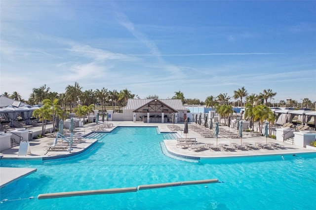 view of swimming pool with a patio