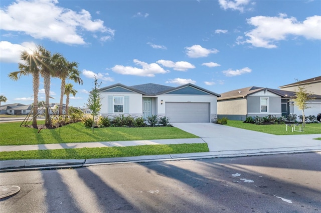 single story home featuring a garage and a front lawn