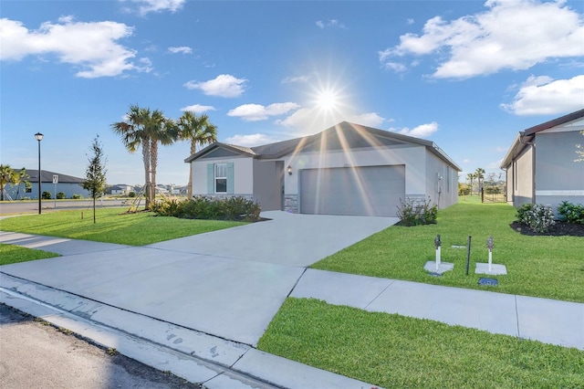 view of front of house featuring a garage and a front yard