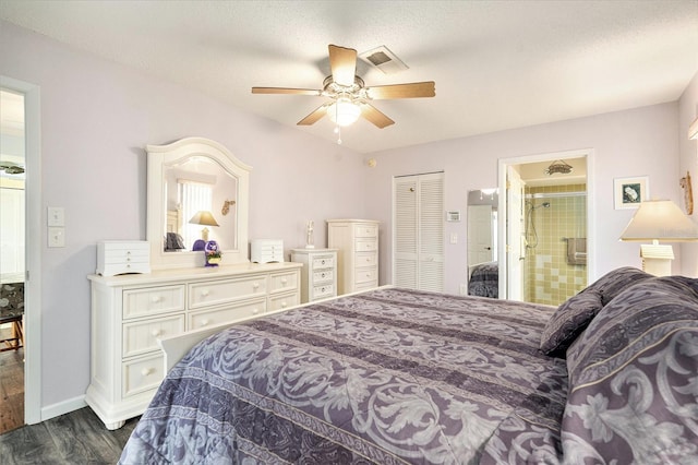 bedroom featuring dark hardwood / wood-style floors, connected bathroom, a textured ceiling, and ceiling fan