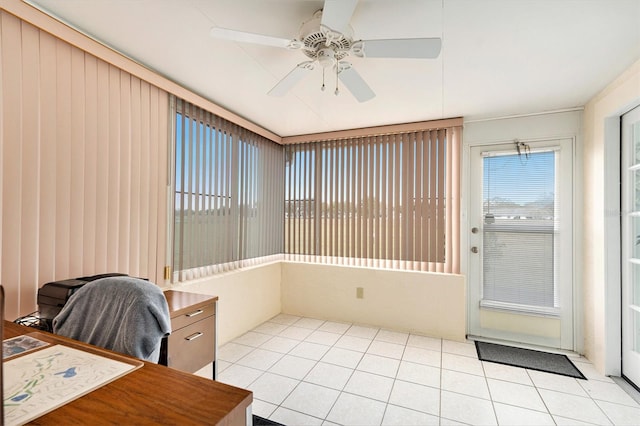 office featuring light tile patterned floors and ceiling fan