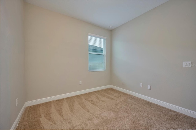 spare room featuring carpet flooring