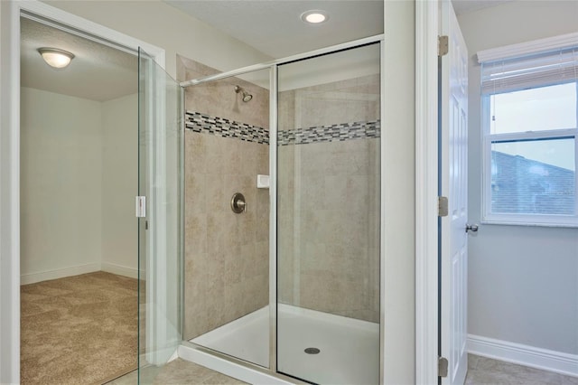 bathroom with an enclosed shower