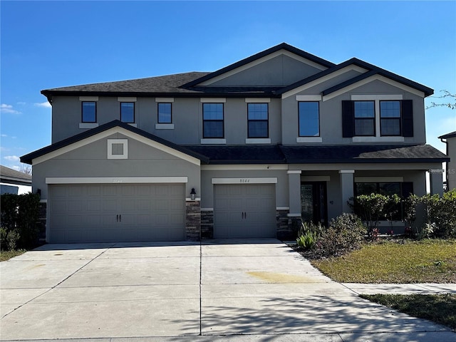 view of front of property with a garage