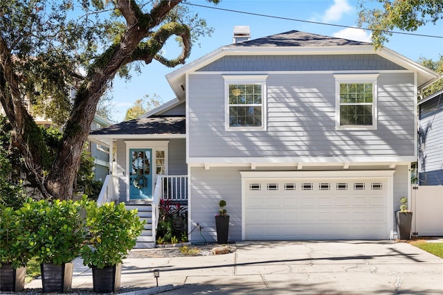 view of front of property featuring a garage