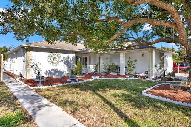 single story home with a front yard