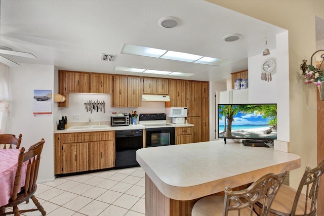 kitchen with light tile patterned flooring, black dishwasher, sink, electric range, and kitchen peninsula