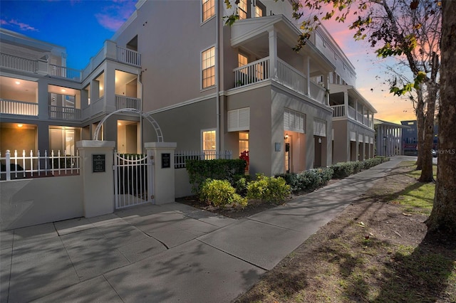 view of property exterior at dusk