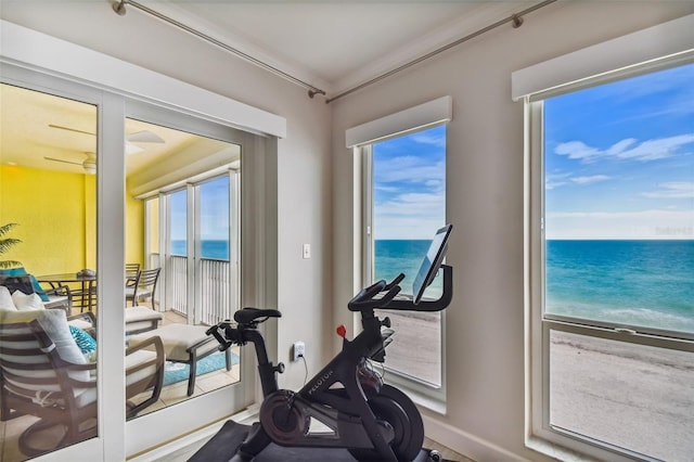 workout room with a water view