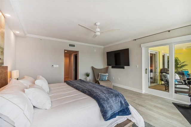 bedroom featuring ornamental molding, ceiling fan, and light hardwood / wood-style floors