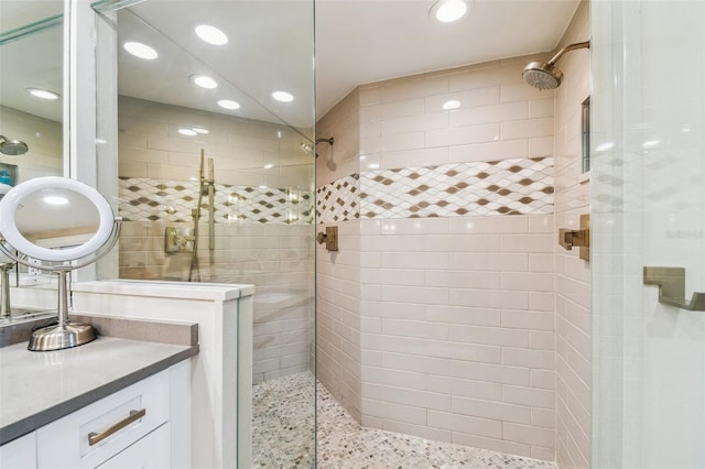 bathroom with vanity and an enclosed shower