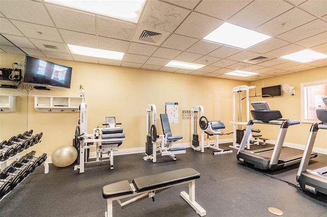 workout area with a drop ceiling