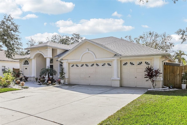 view of front of property with a garage