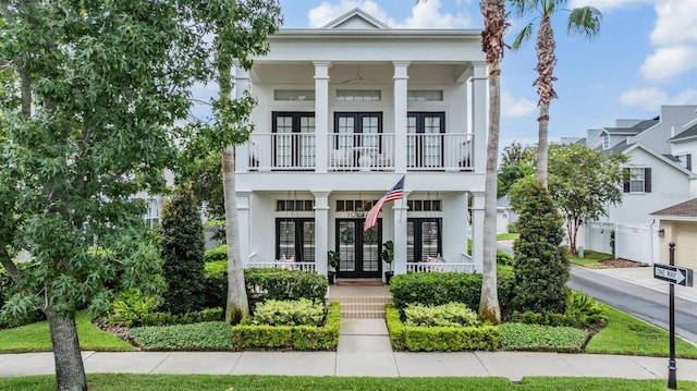 neoclassical home with french doors