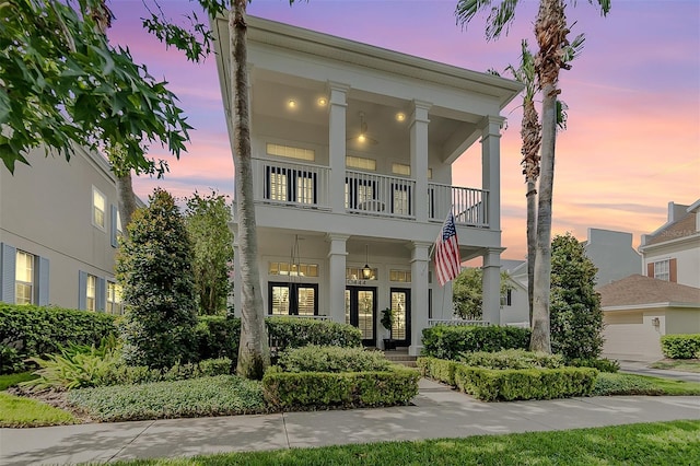 neoclassical / greek revival house with a balcony