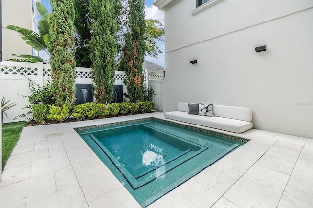 view of pool with a patio area