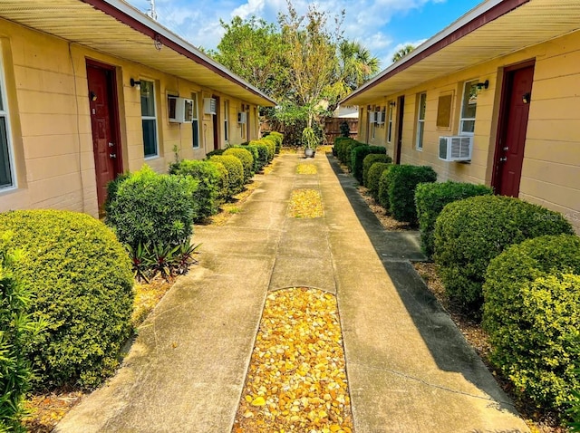 view of side of property with cooling unit