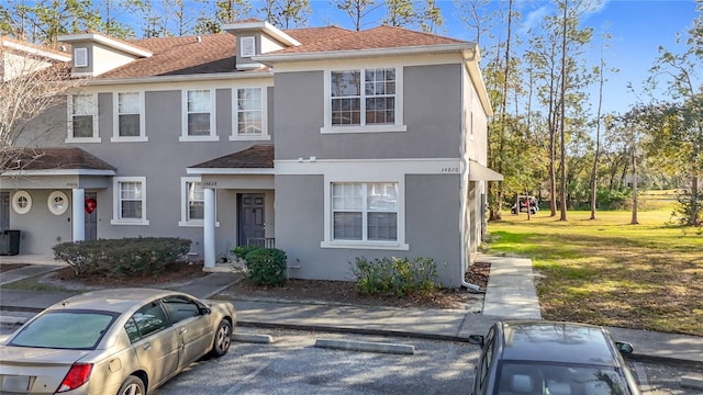 view of property with a front yard