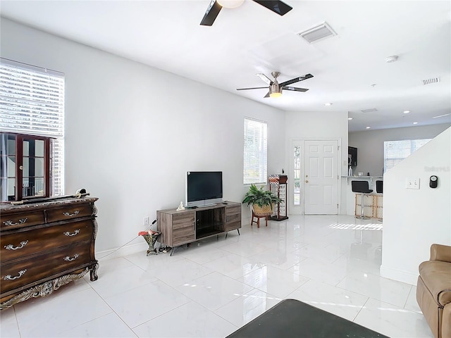 living room with ceiling fan