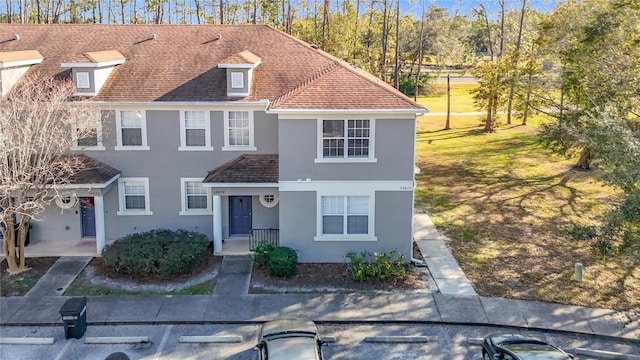 view of front of house with a front lawn