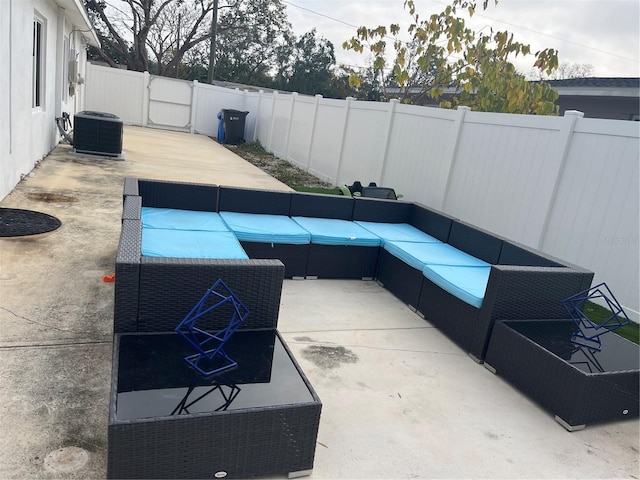 view of patio / terrace with outdoor lounge area and central AC unit