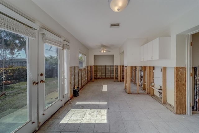 interior space featuring light tile patterned floors