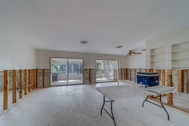 interior space featuring ceiling fan