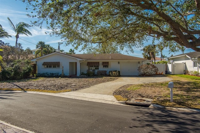 single story home with a garage