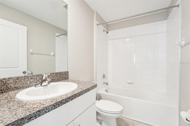 full bathroom with shower / bath combination, vanity, tile patterned floors, and toilet