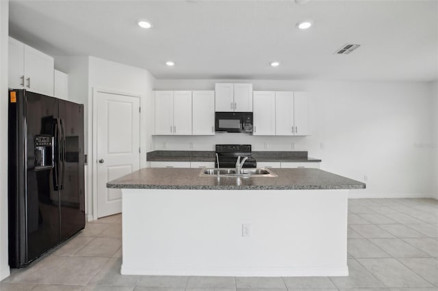 kitchen featuring a sink, visible vents, white cabinetry, black appliances, and dark countertops