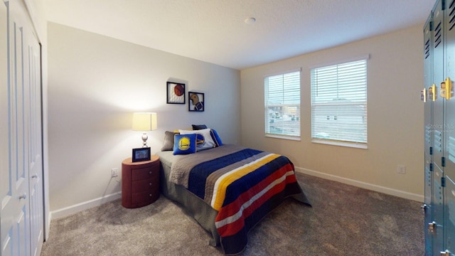 carpeted bedroom featuring a closet