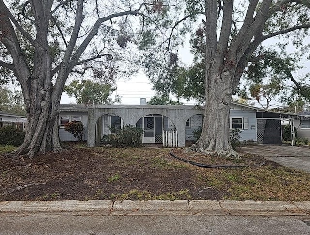 6692 17th Way N, Saint Petersburg, FL 33702 - ranch-style house featuring a carport