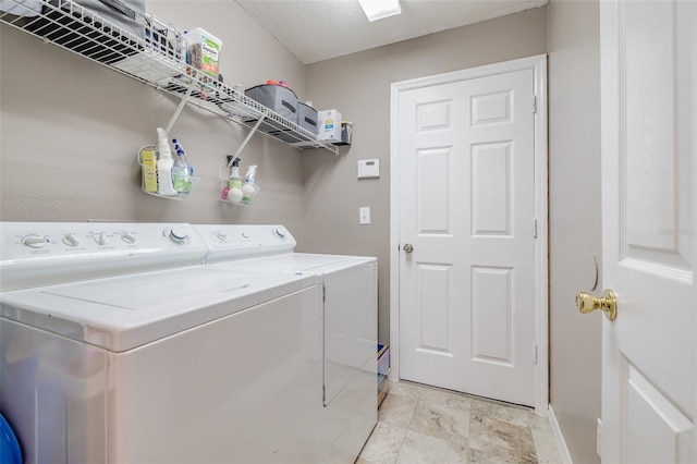 laundry room featuring separate washer and dryer