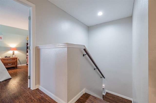 stairs with wood-type flooring