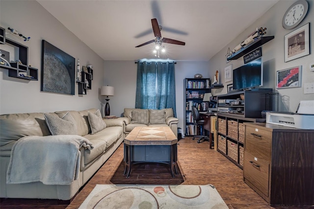 living room featuring hardwood / wood-style flooring and ceiling fan