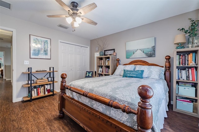 bedroom with a closet, dark hardwood / wood-style floors, and ceiling fan