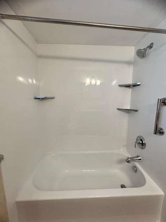 bathroom with shower / bathtub combination