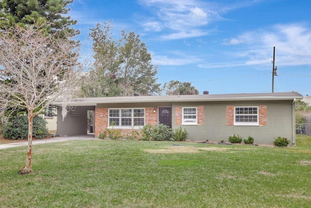 ranch-style house with a front lawn and a carport