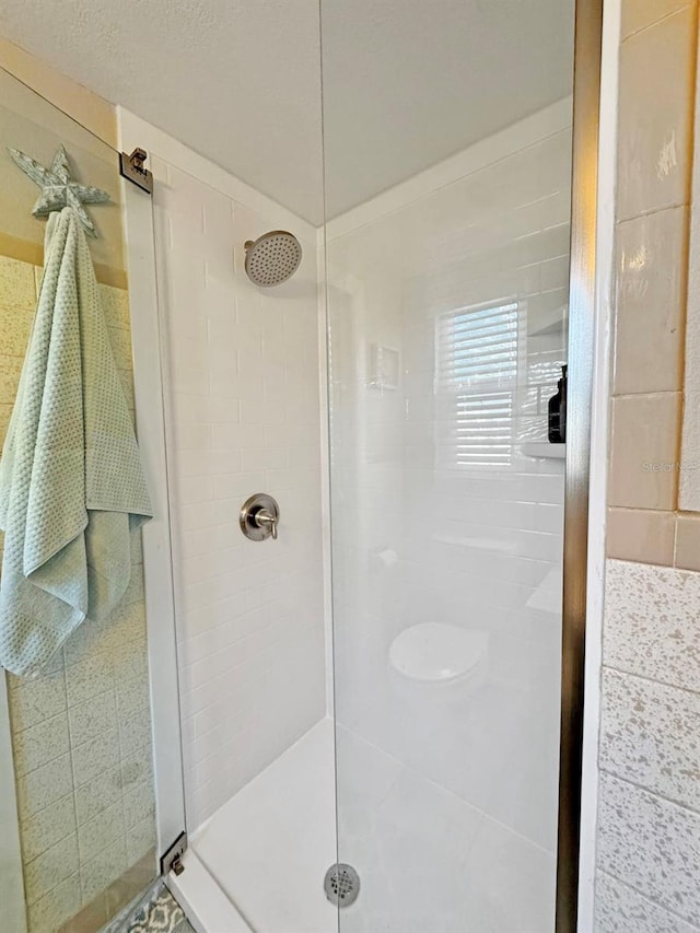 bathroom featuring walk in shower