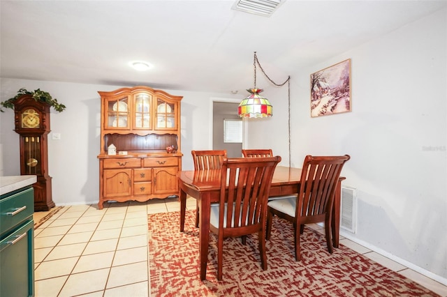 dining space with light tile patterned flooring