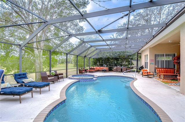 view of pool with a lanai, ceiling fan, a patio, an outdoor living space, and an in ground hot tub